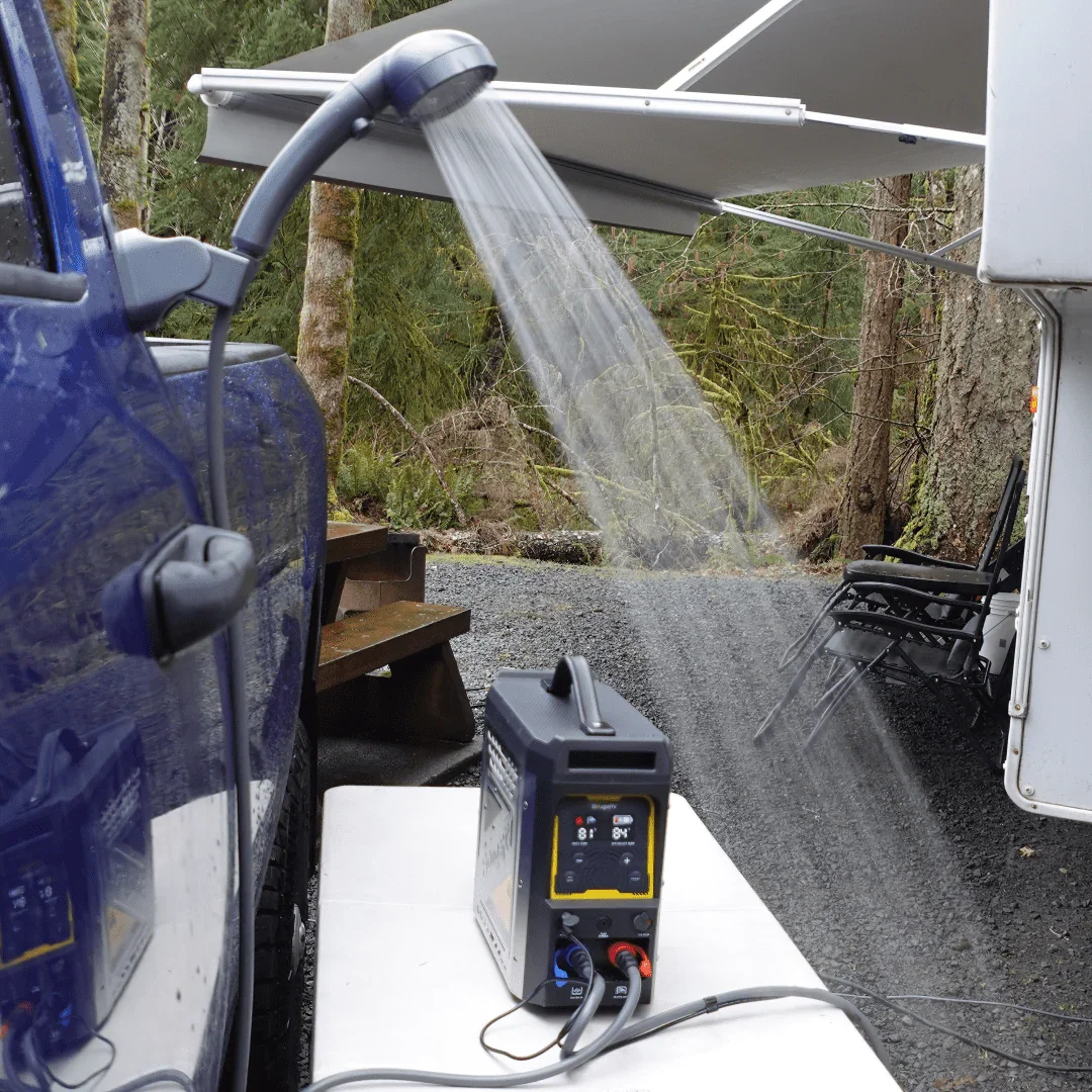 BougeRV propane water heater running a shower beside a vehicle