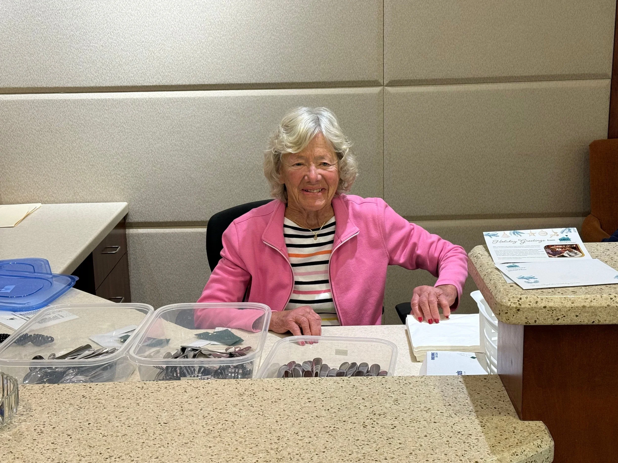 Ann_front_desk_volunteer.jpg