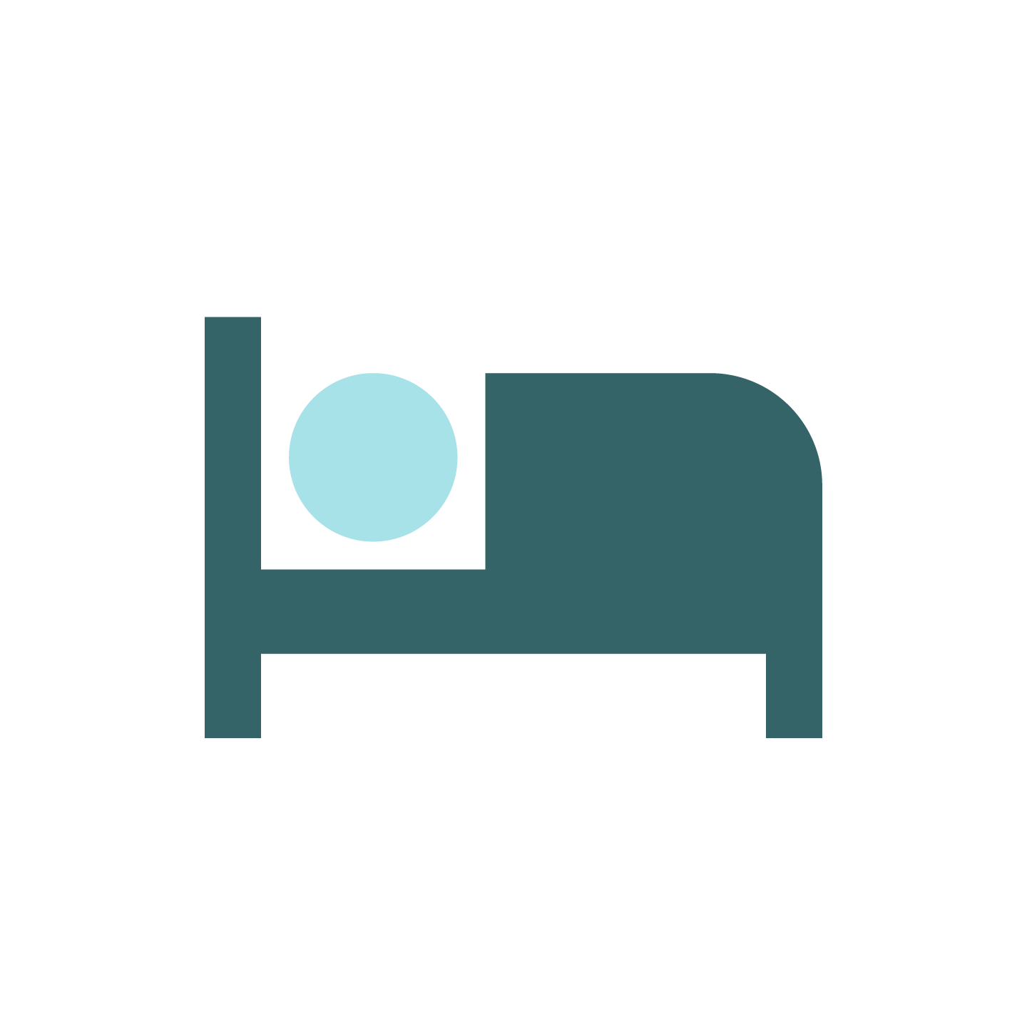 A stylized bed with a blue circular pillow on it.
