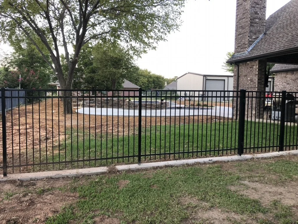 iron fence 3 rail.jpeg