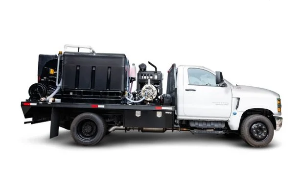 Harben 4018 "P Type" truck-mounted jetter on a flatbed truck, engineered for sewer and industrial contractors.