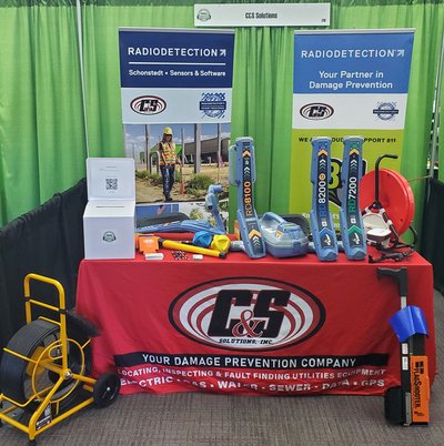 C&S Solutions trade show booth displaying utility locating equipment at the 2024 Midwest Damage Prevention Conference and Expo in French Lick, Indiana.