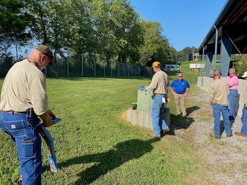 Crew members observing a utility locator demonstration outdoors for the City of Loudon, Tennessee with Hi-Line Utility Supply.