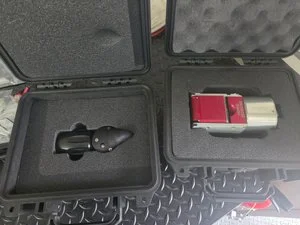 Open storage case in the sewer inspection van holding hand tools and equipment.