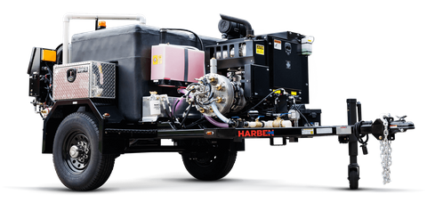 Harben trailer-mounted hydro jetting unit with engine, hose reel, and tank for sewer line cleaning.