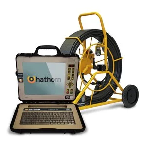 Hathorn H12+ Control Module with laptop-style monitor connected to a camera reel for pipe inspections.