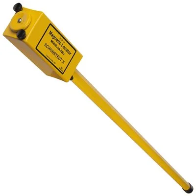 Classic Schonstedt yellow magnetic locator used for detecting buried ferrous utility markers.
