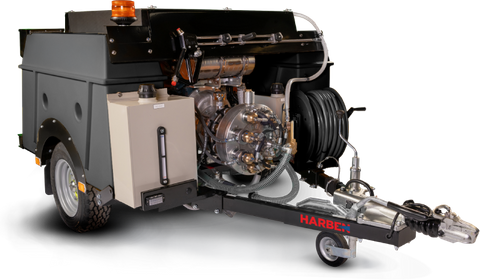 Harben DTK130 compact trailer jetter used for residential and light commercial sewer line cleaning.