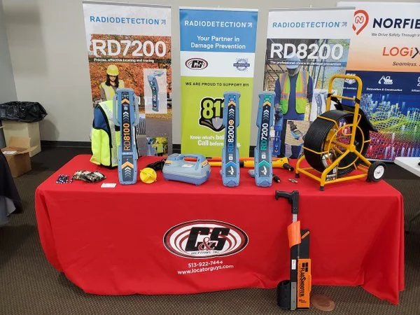 C&S Solutions trade show booth display featuring Radiodetection RD7200 and RD8200 utility locators and cable/pipe locating equipment.