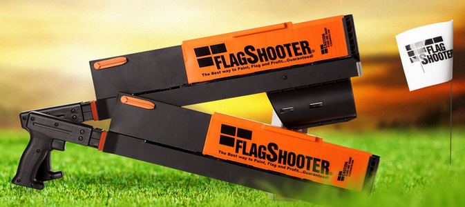 Flagshooter flag insertion tool used for marking underground utilities in the field.