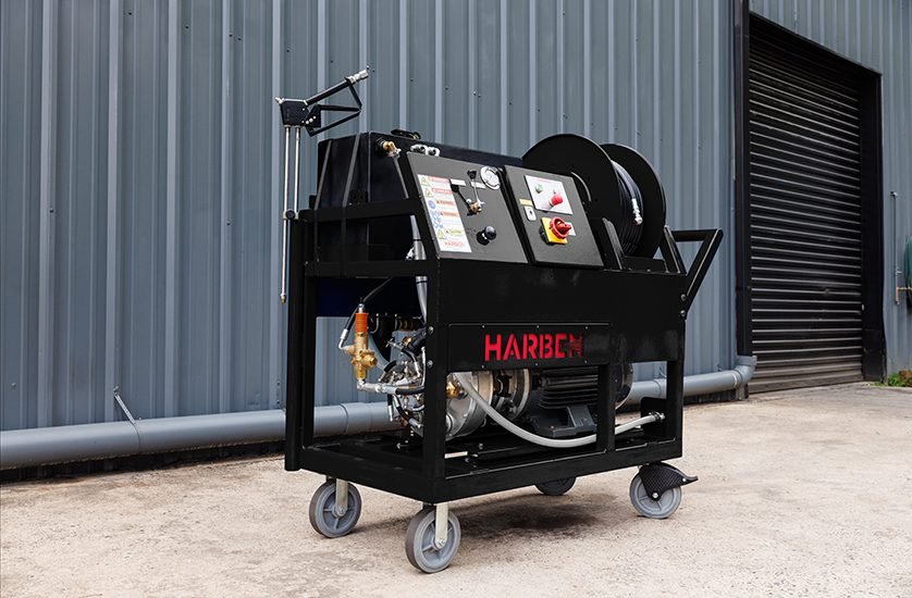 Harben mobile hydro jetting cart with hose reel, used for sewer and drain line cleaning.