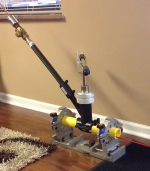 Ball valve and 2-inch nipple assembly from the Jameson lateral gas line tracer kit mounted indoors.