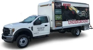 Aries Industries branded box truck used for underground sewer and pipeline inspection services.