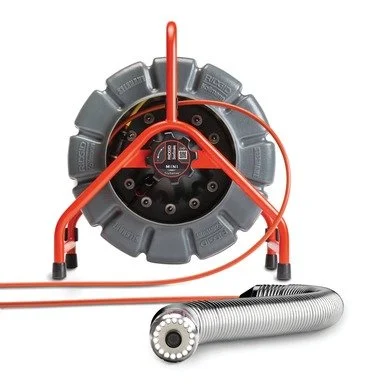 RIDGID SeeSnake Mini pipe inspection camera reel with TruSense technology and self-leveling camera head.