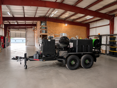 Harben trailer jetter parked inside a warehouse facility.
