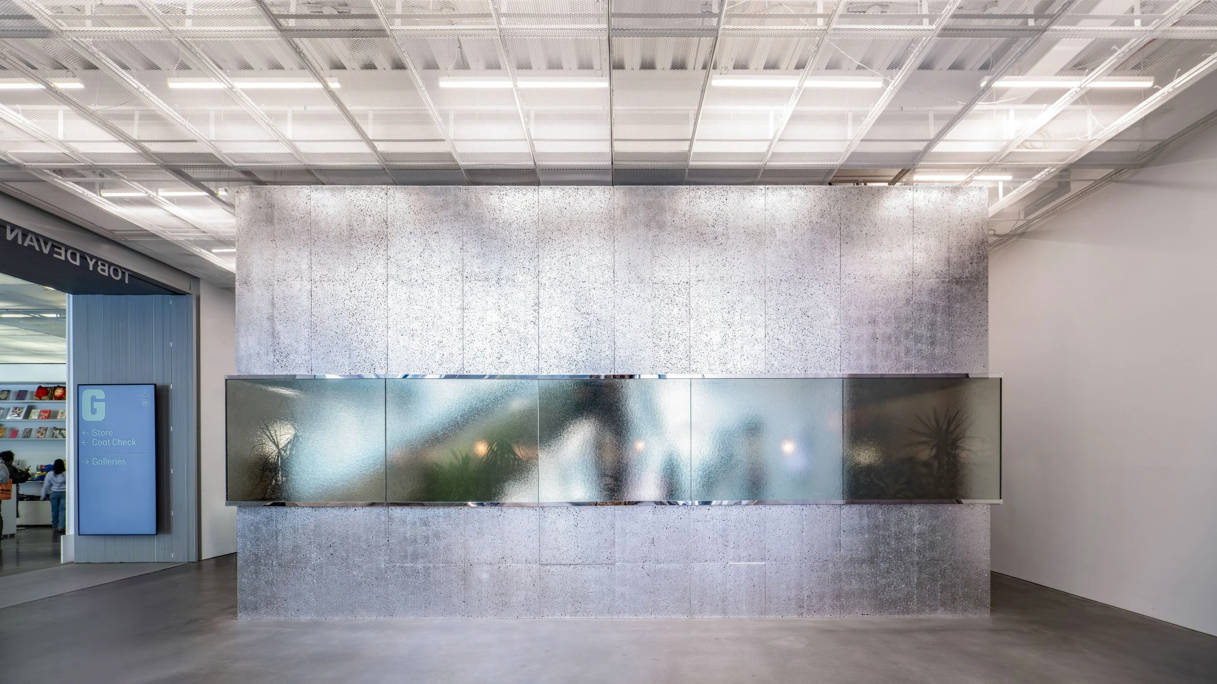 A view of the encased metallic box that is Oberon inside of the New Museum lobby. 