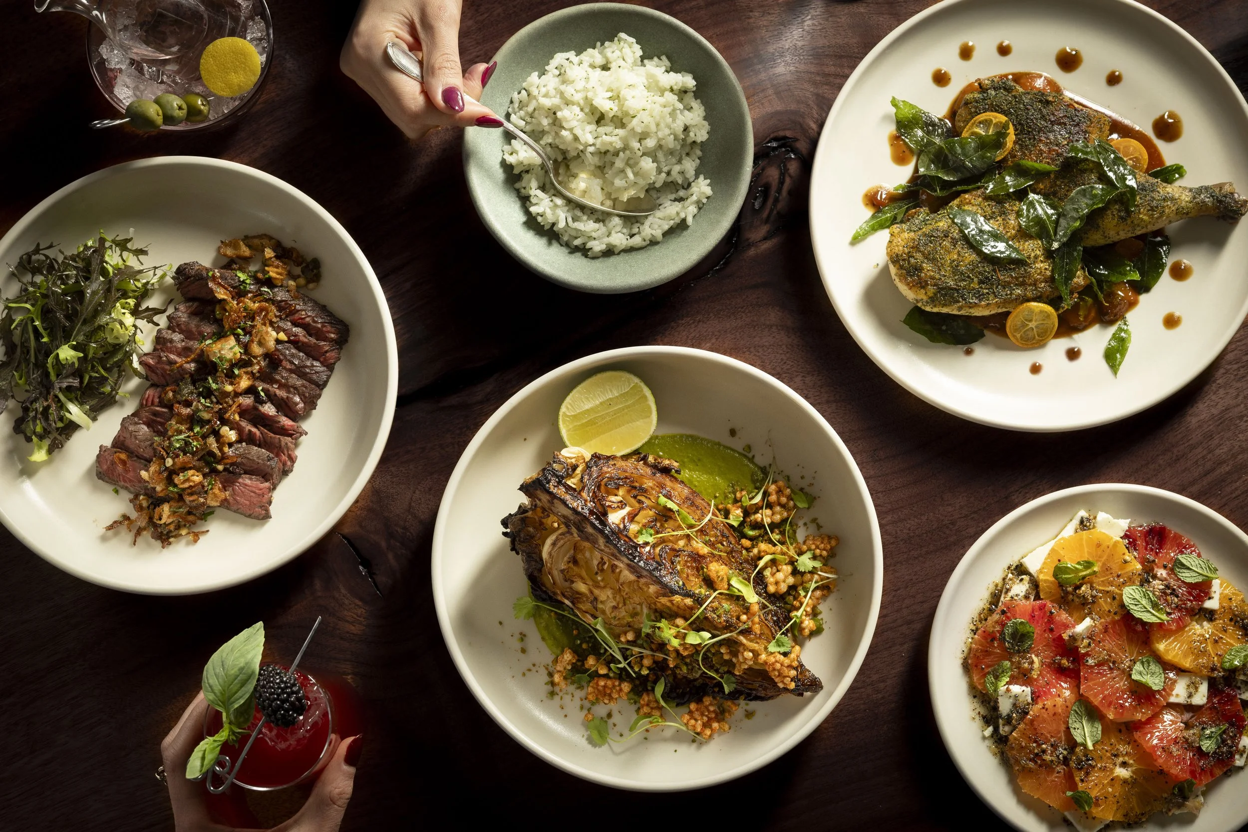 Menu by Julia Sherman and Ali Ghriskey, including steak, dorade, chicken, and rice.