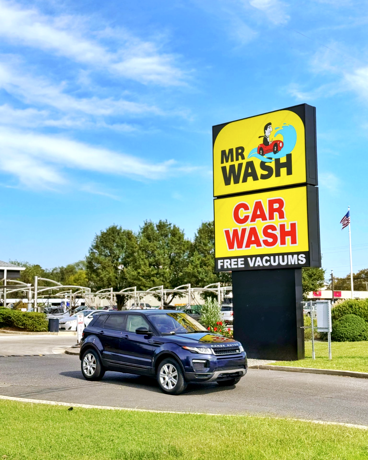 Clean car exiting a Mr Wash Car Wash location in Rohoboth, DE
