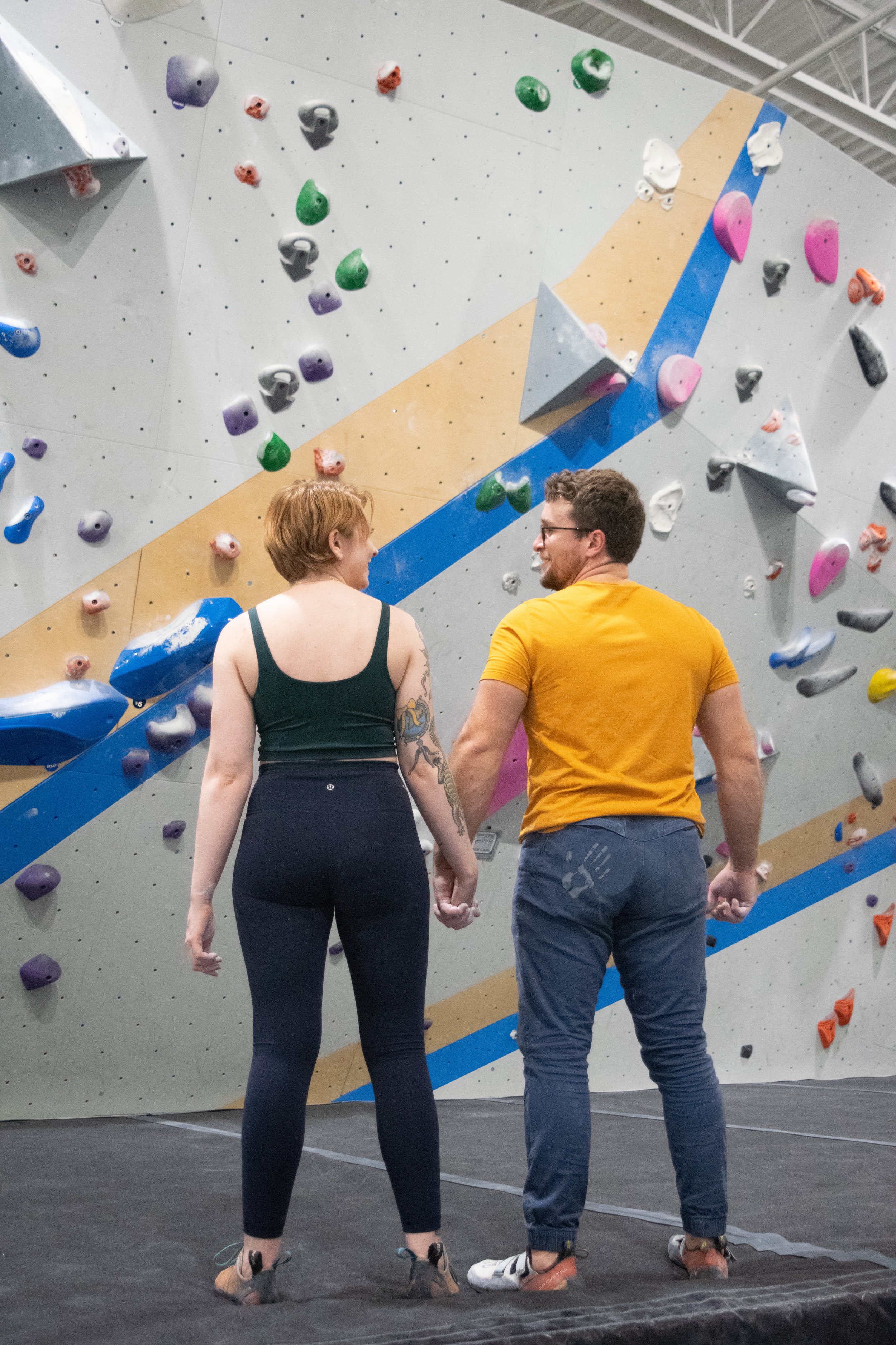 Rock Gym Smiling at each other hand print on butt.jpg