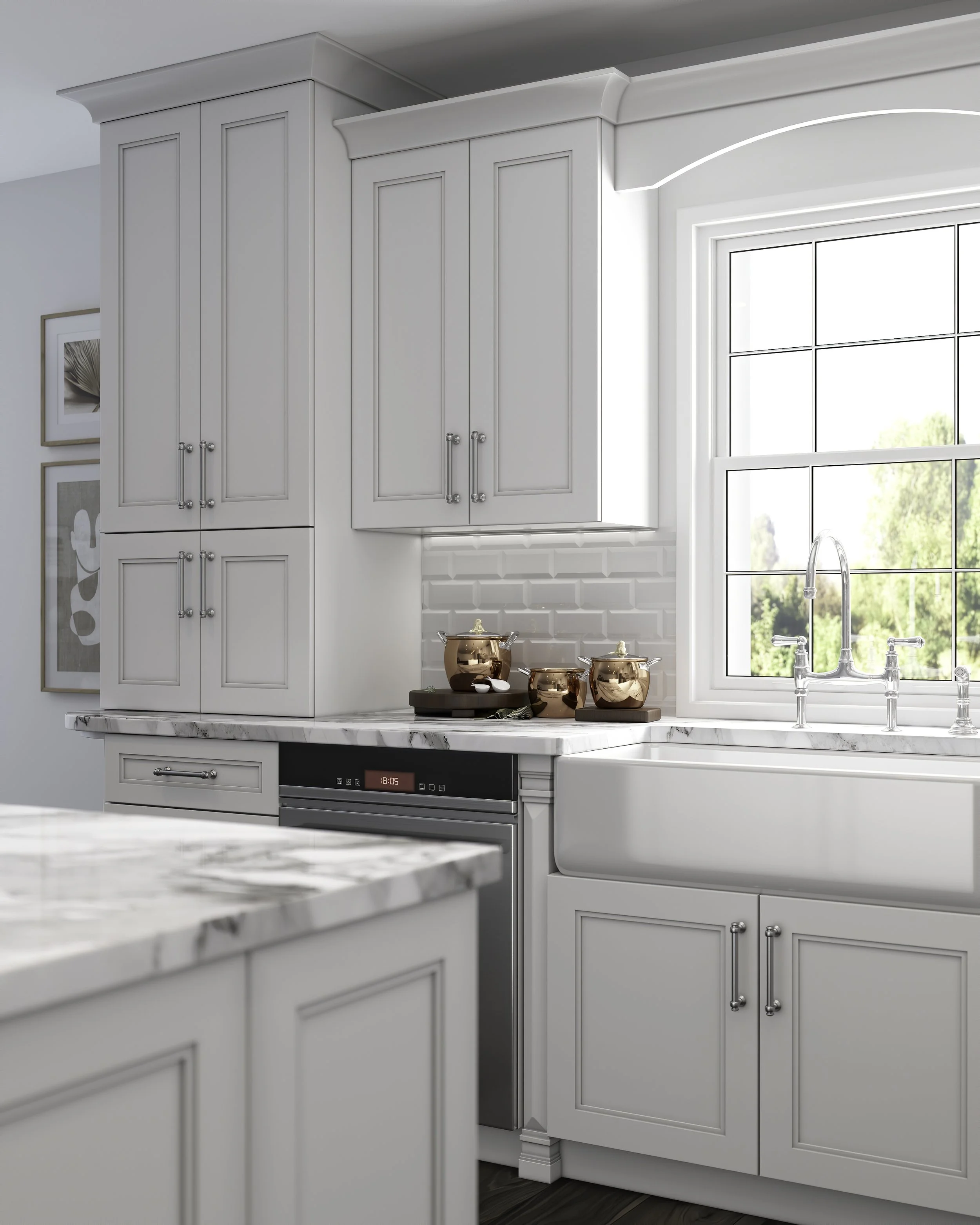 White kitchen cabinets next to a large window, with copper pots on a marble countertop, and a faucet above the sink.