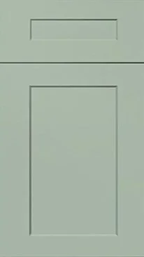 A plain, light green cabinet door with a small horizontal slot at the top.