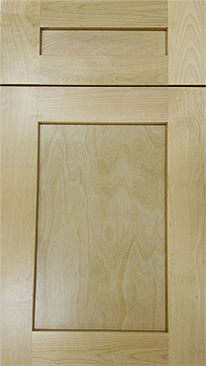 Close-up of a light wooden cabinet door with a simple recessed panel design.