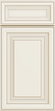 Close-up of a white kitchen cabinet door with decorative molding.
