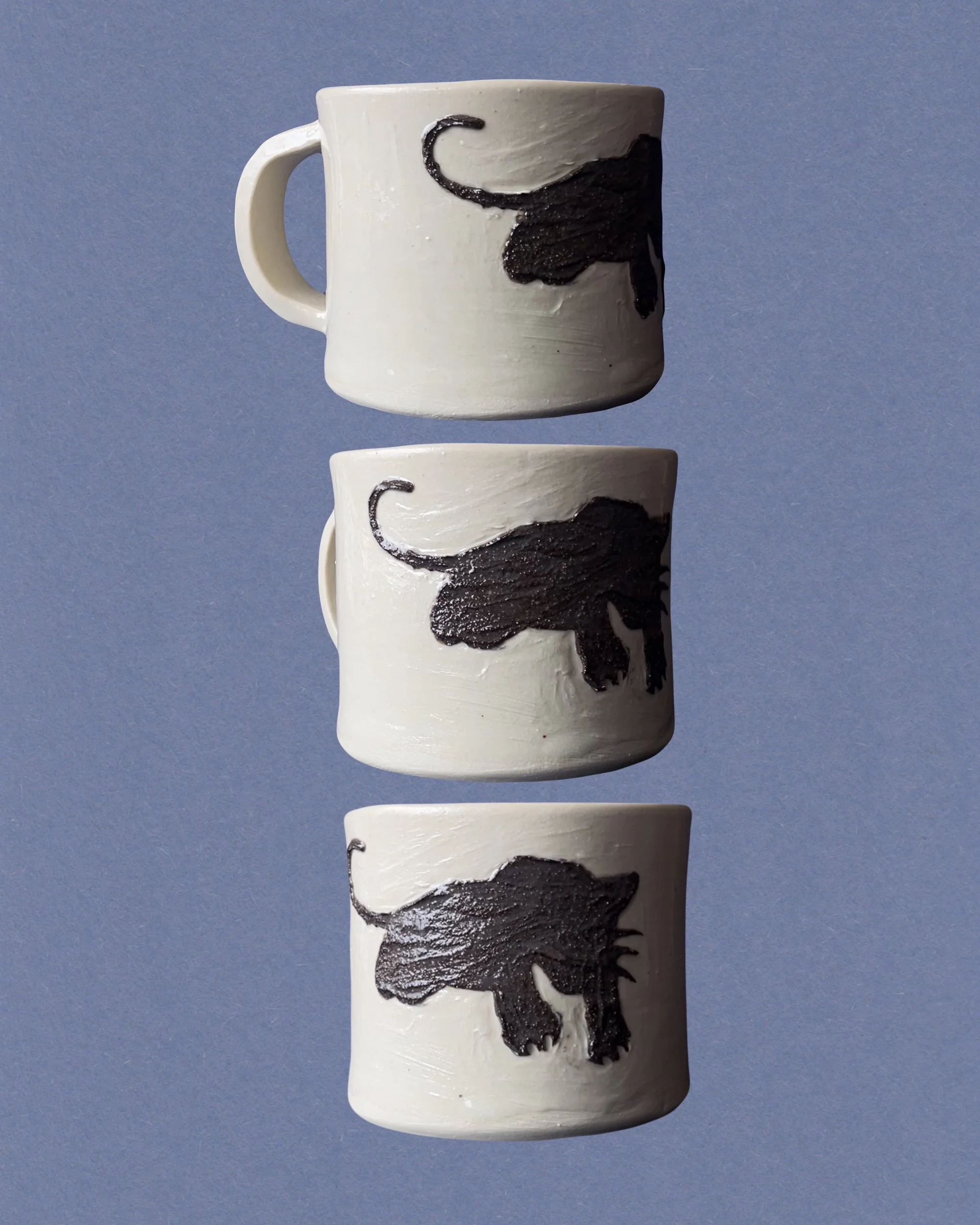 white mug with black panther icon