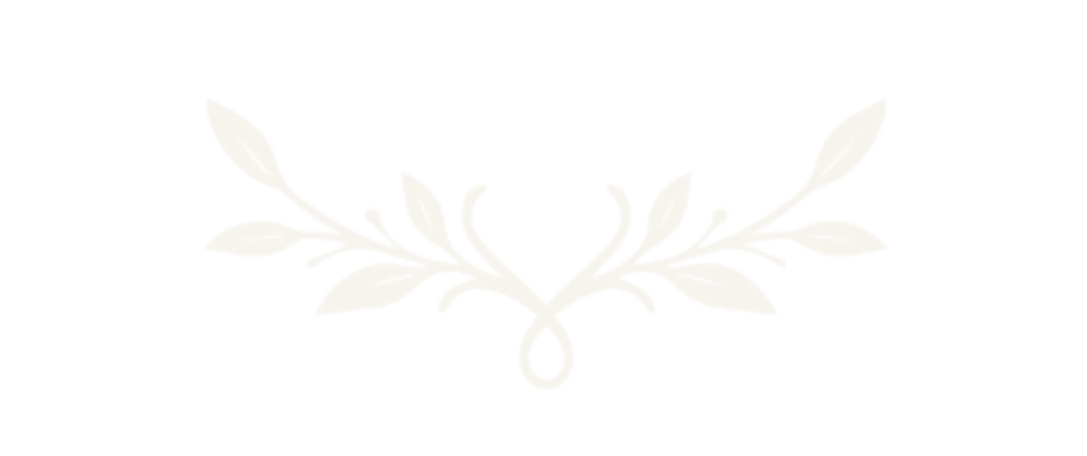 White decorative floral design on black background.