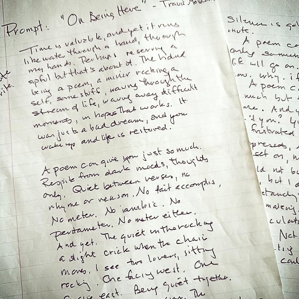 Handwriting on lined notebook paper, with a prompt titled 'On Being Here' by Travis Mason, discussing the value of time and the act of writing poetry.