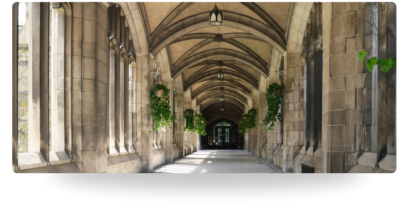 Stone archway on a college campus, representing therapy support for students navigating academic pressure and life transitions