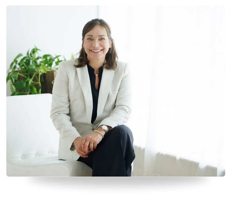 Farrah Chrstos, LCSW, LISW, MSW smiling, and wearing a beige blazer