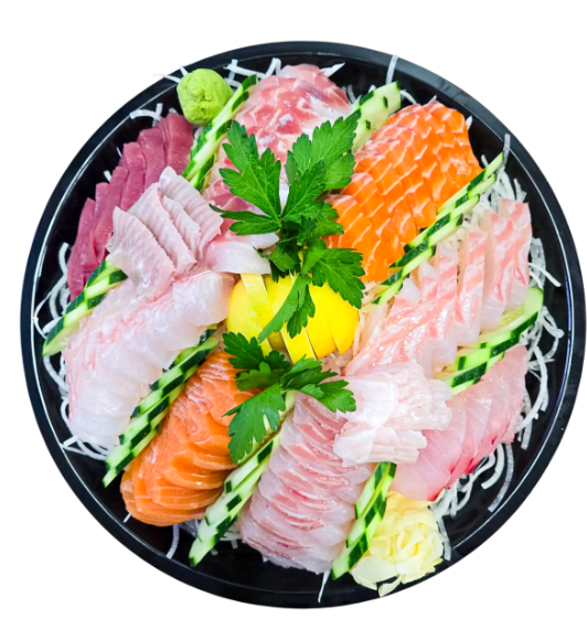 Assorted sliced raw fish and seafood atop shredded daikon radish, garnished with green onions, parsley, lemon wedge, wasabi, and sliced cucumber.