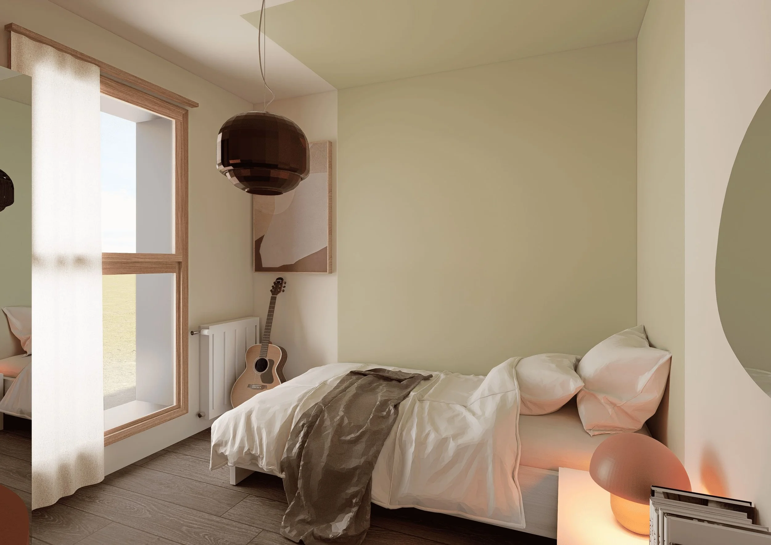 La chambre d'amis conserve une implantation simple et fonctionnelle, réchauffée par quelques touches de couleur.