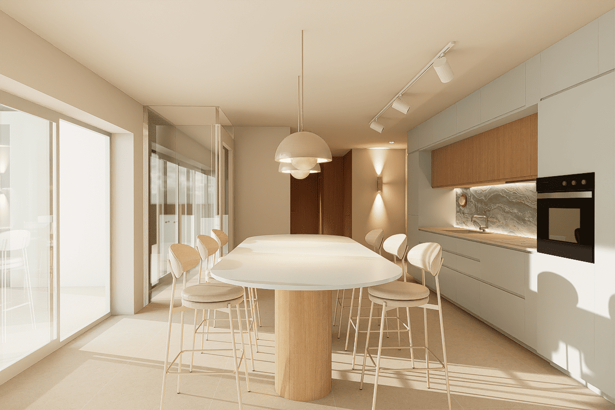 Un espace de vie ouvert où cuisine et salle à manger s'articulent autour d'un îlot central pensé comme le cœur du projet.
