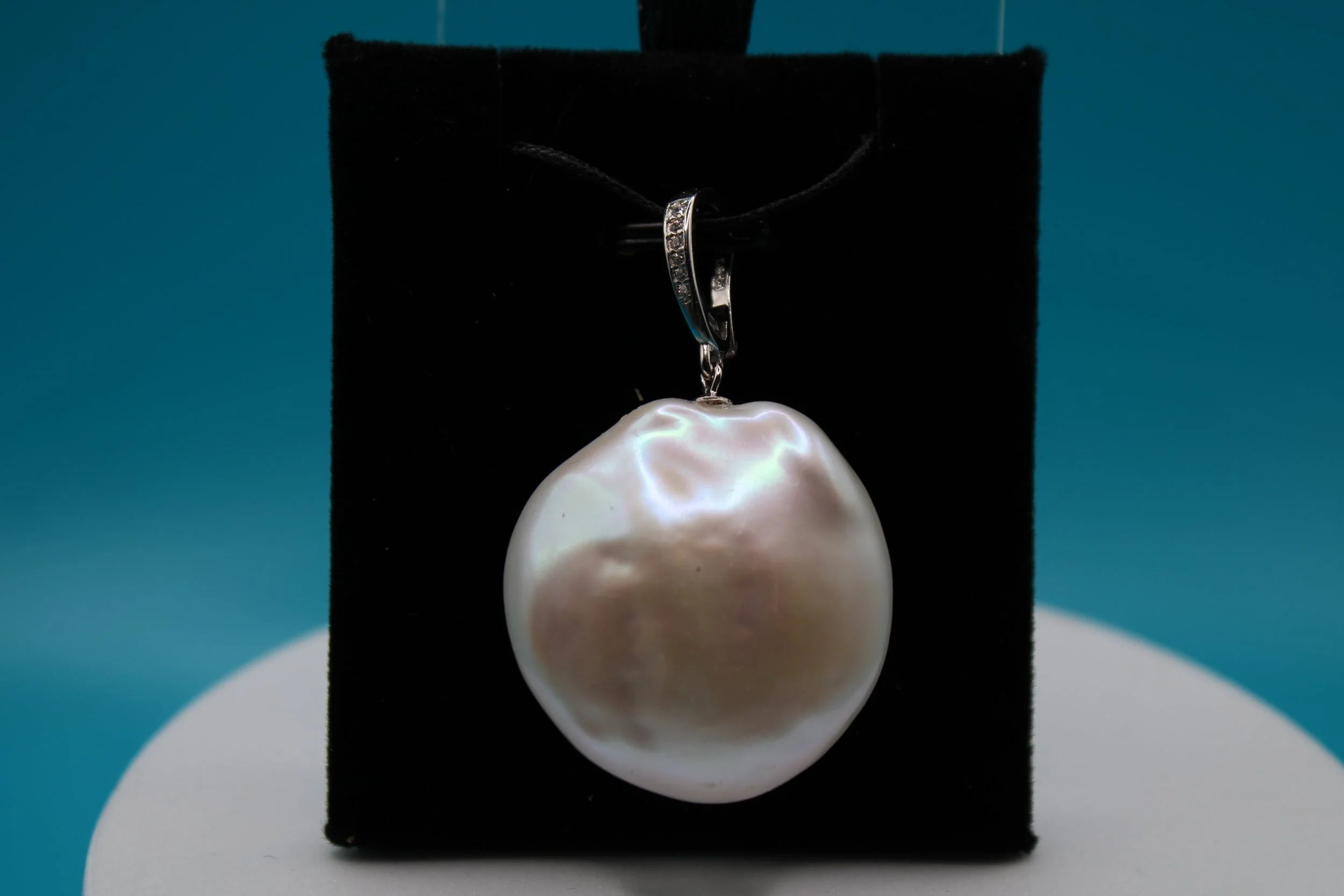 The Monarch's Sphere Pendant