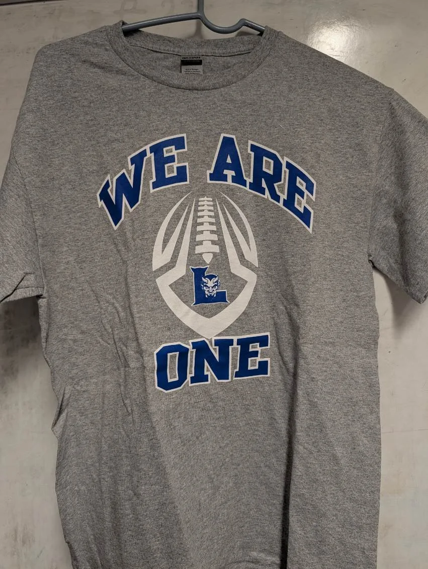 Gray T with white football.jpg