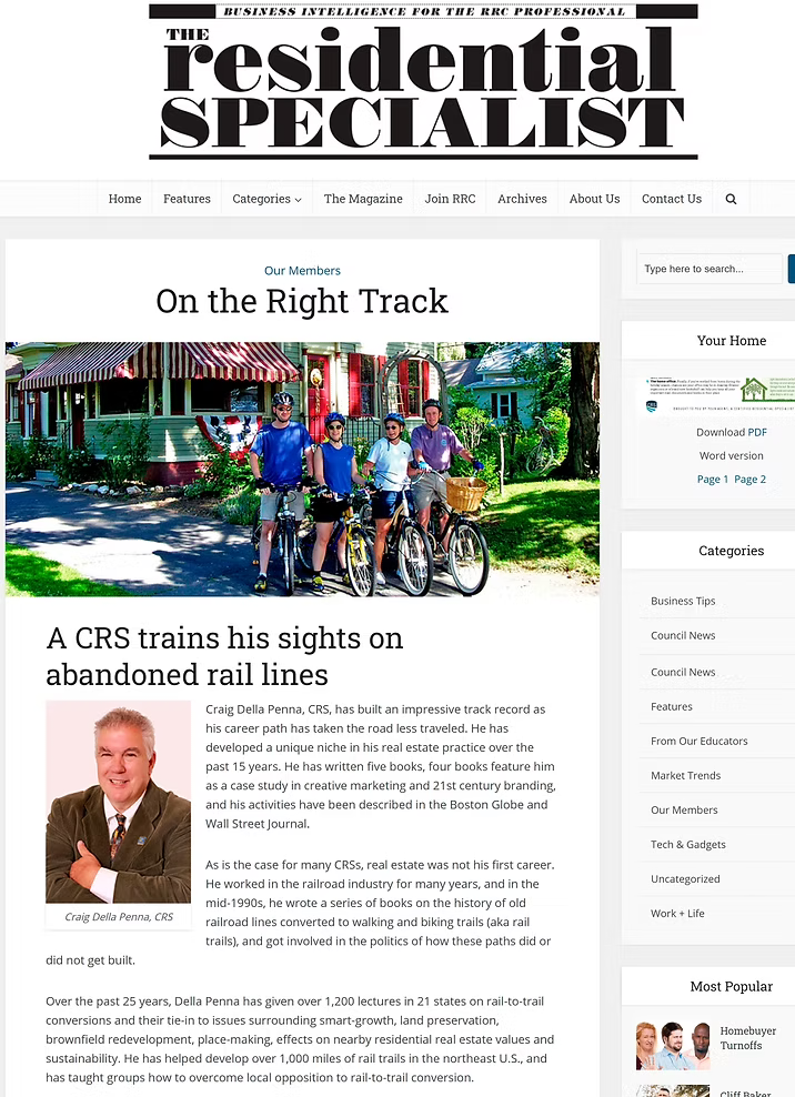 Screenshot of the website 'The Residential Specialist' showing an article titled 'On the Right Track' about Craig Della Penna, CRS, with a photo of him and a group of five people on bikes in front of a colorful house.