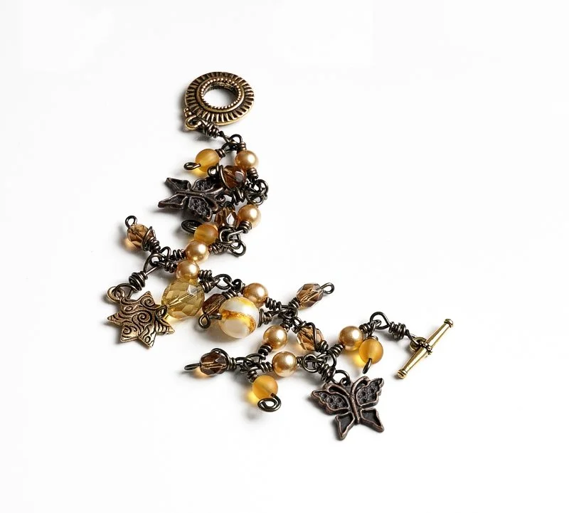 Earthy, nature-inspired charm bracelet