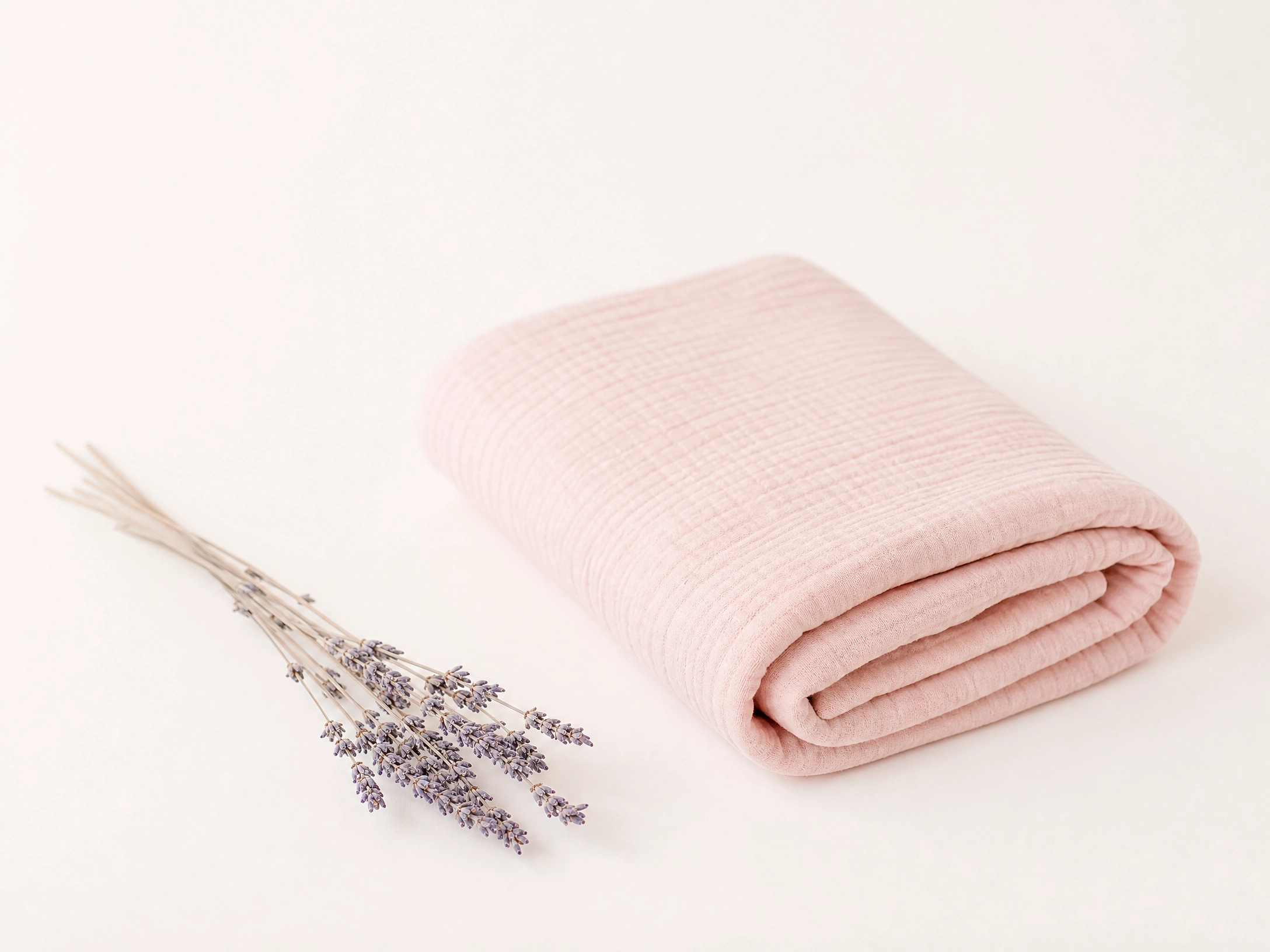 Pink blush blanket for Postpartum recovery guide, 6-week postpartum recovery, evidence-based postpartum care, new mother wellness guide.