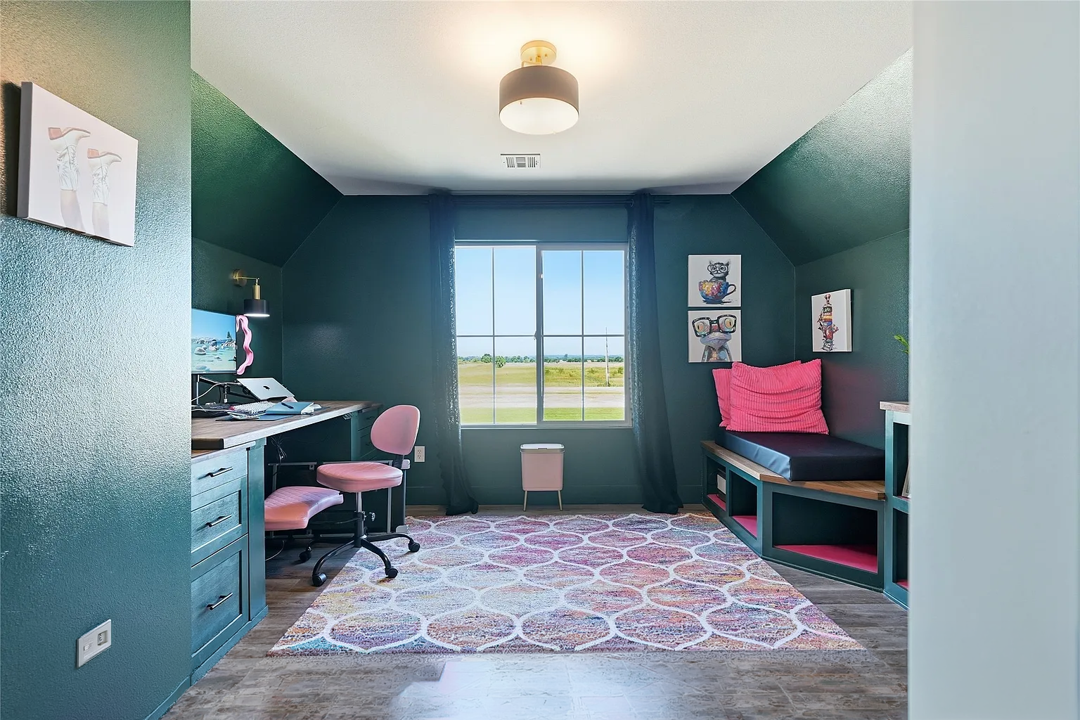 Client requested Green and Pink theme. Across one wall, cabinetry stretches from one side to the other, Moving from bookshelf to reading nook. 1.5" thick walnut tops. 

Along the opposite wall, A standing desk is carefully concealed inside hollow leg