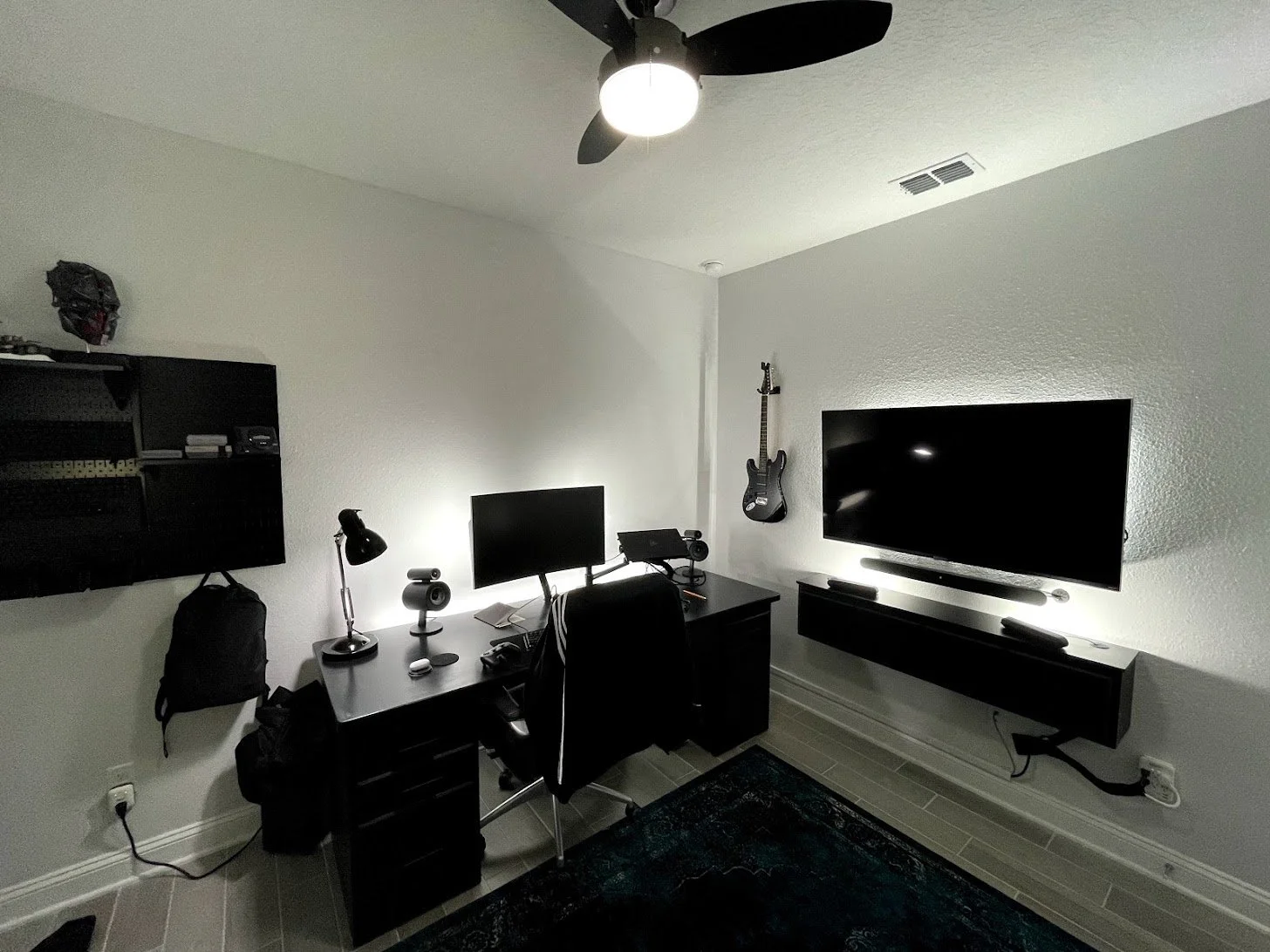 Custom Desk with floating cabinetry. Lighting and behind-wall wires for entertainment area.