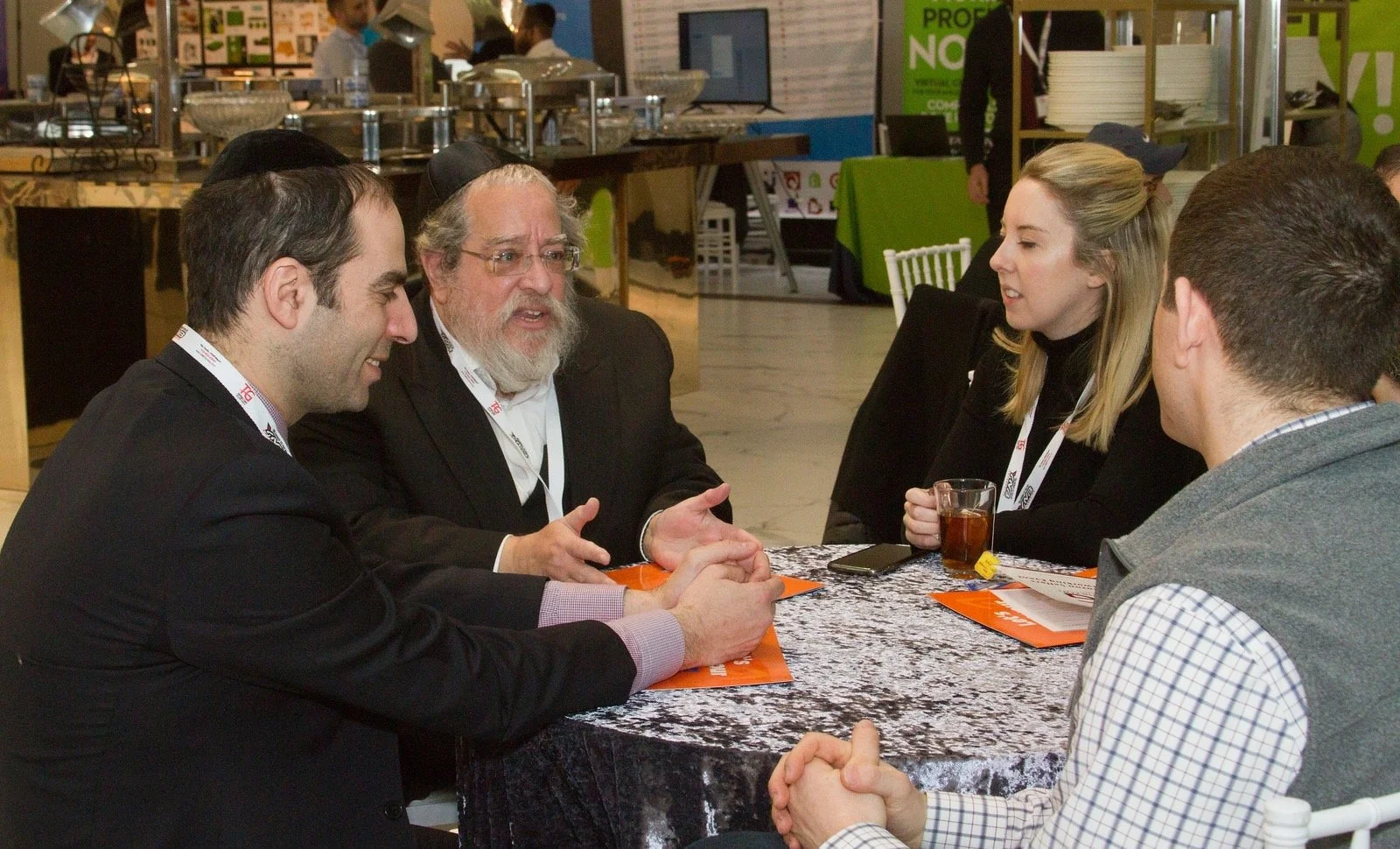 Amazon staff seated with sellers at an ASGTG event, 2019
