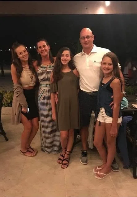 Brian Martinsen with his wife and three daughters