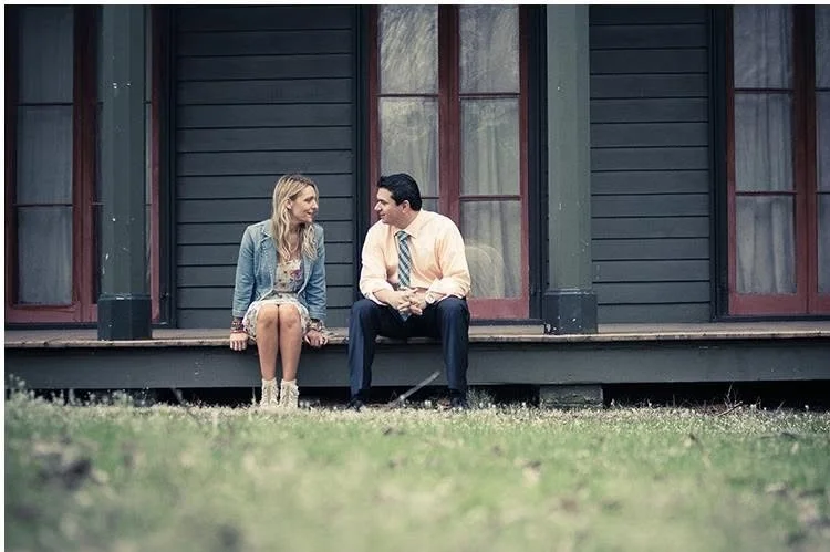 Michael and Nikki Castillero sitting together on porch steps, 2013