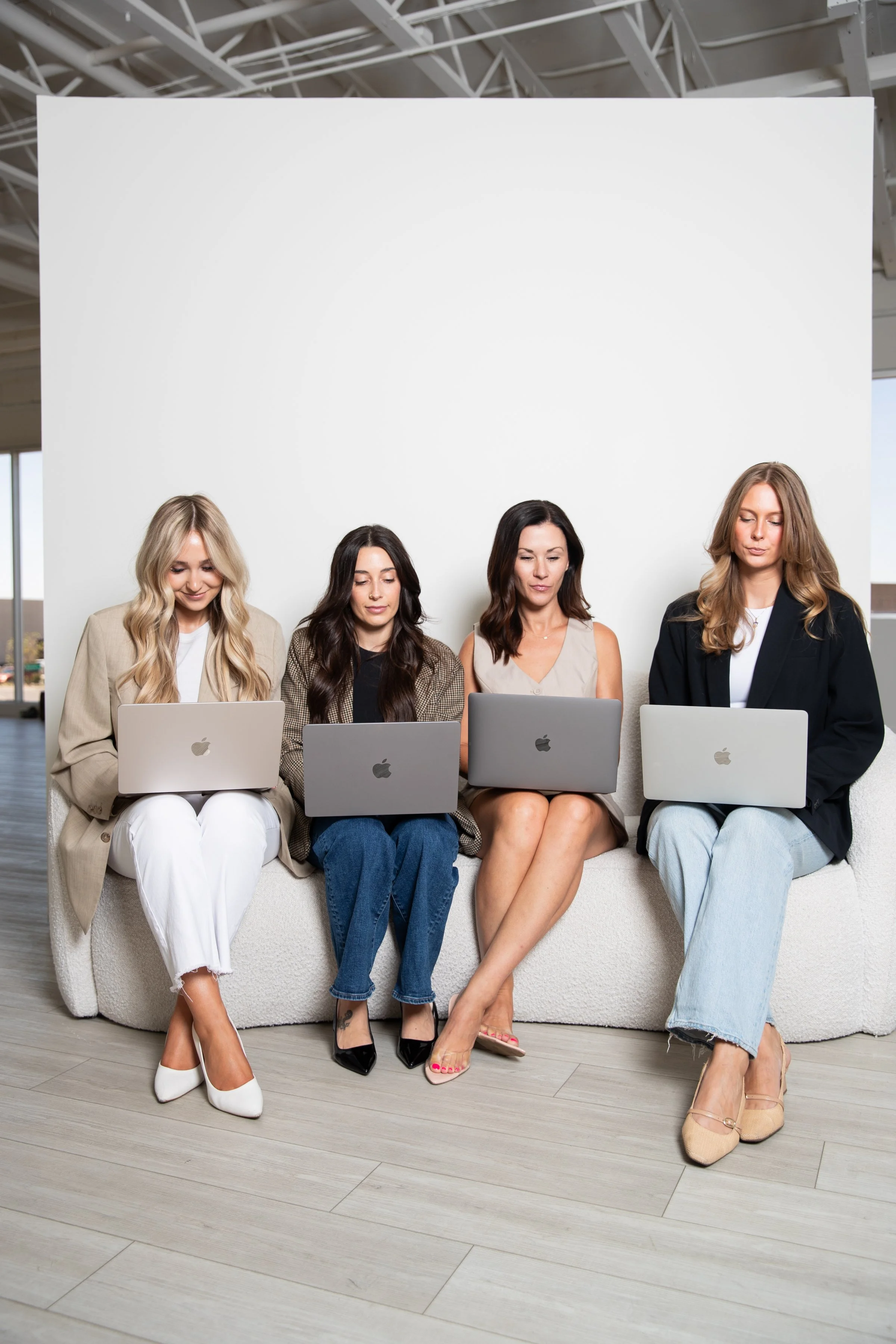 The Mack Agency team working. Scottsdale-based visibility and public relations firm.