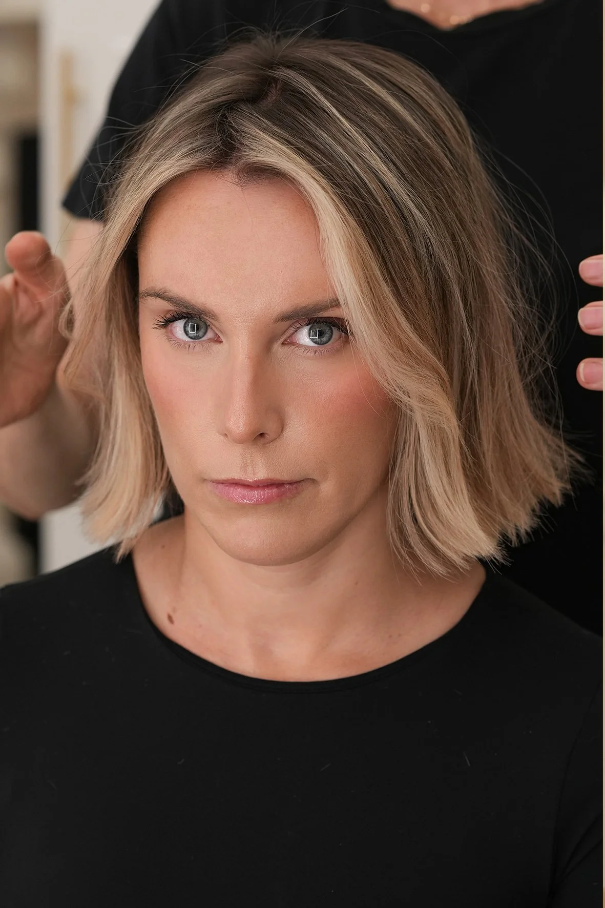 Blonde face framing contour colour on a long bob haircut by Nana Howe.