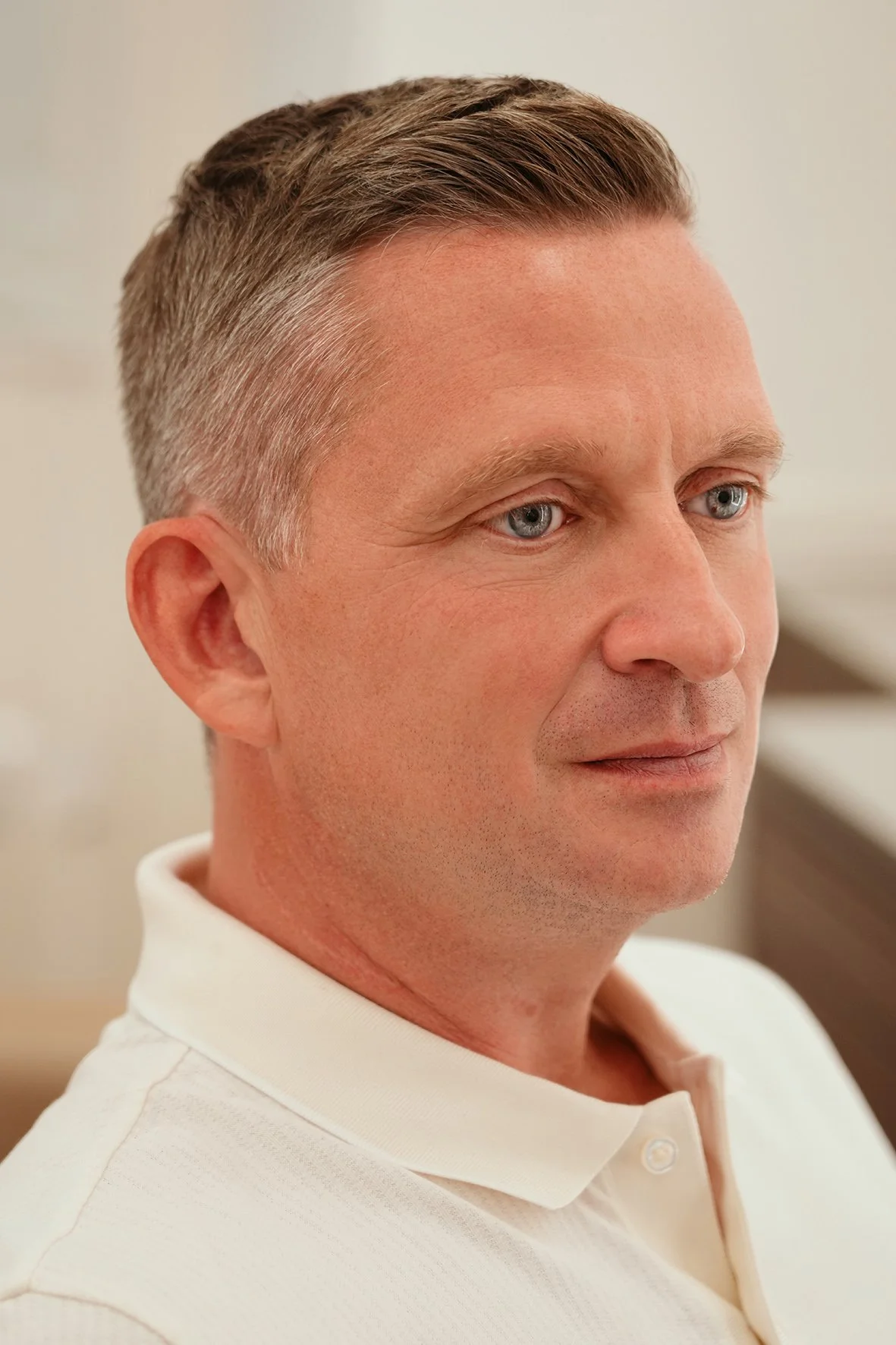 classic gent's haircut, with side part by Milad.