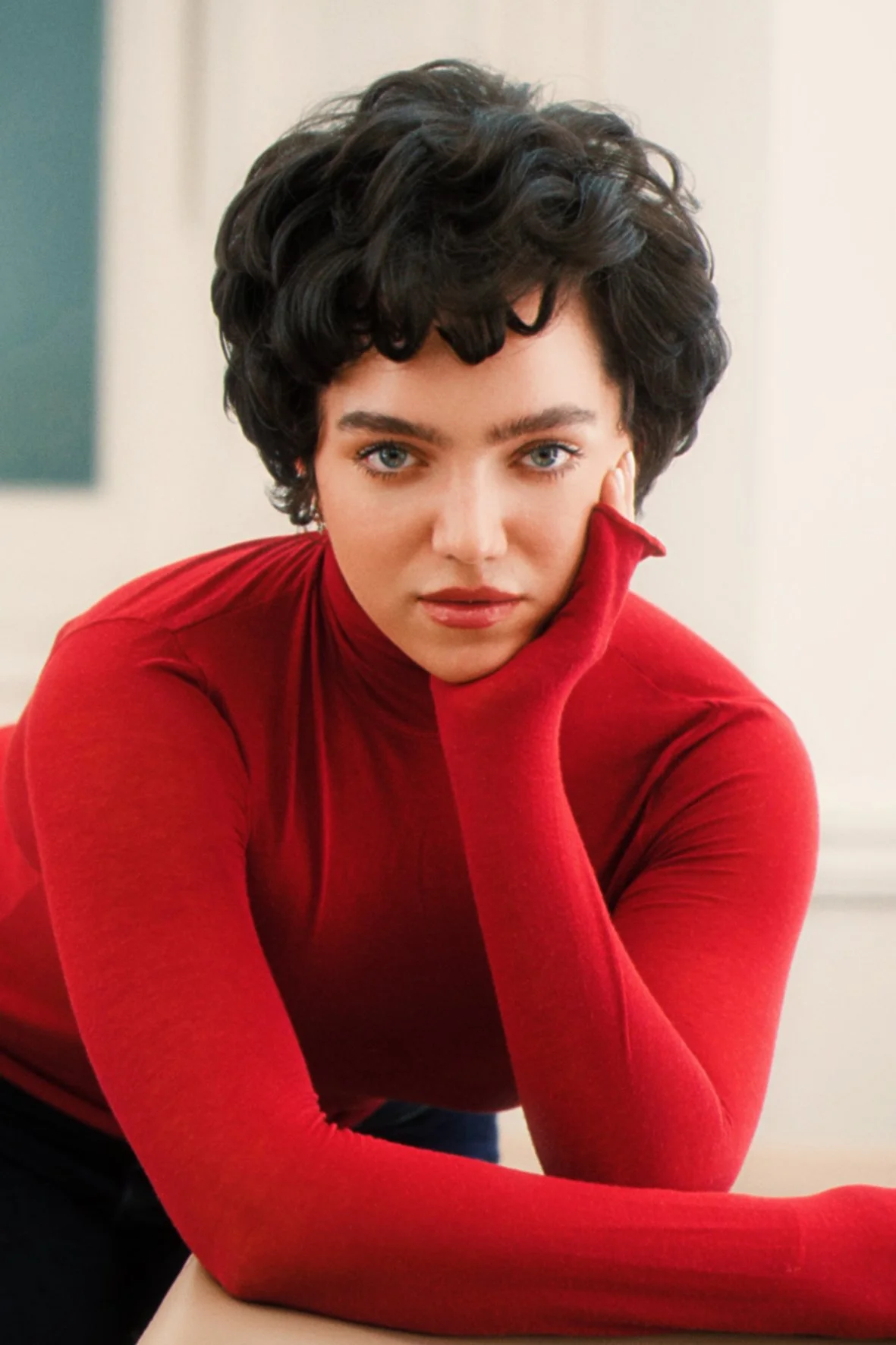 Short soft wavy pixie haircut by Nelson Morales.