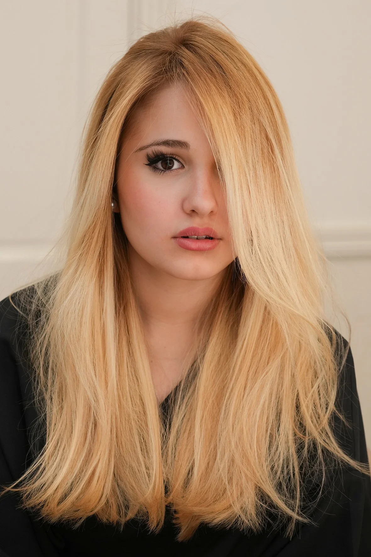 peachy warm light blonde and a soft smooth blow dry finish by Dani Caldeira.
